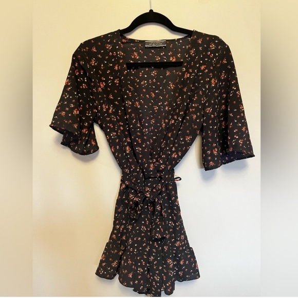 2/$30 Floral Flowy Romper - Picture 2 of 8